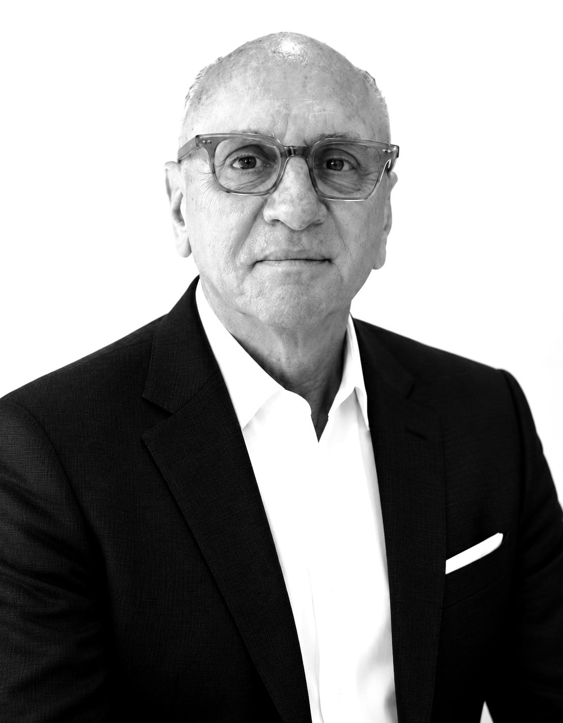 Black-and-white portrait of Reunited Clothing CEO Jerry Finestone