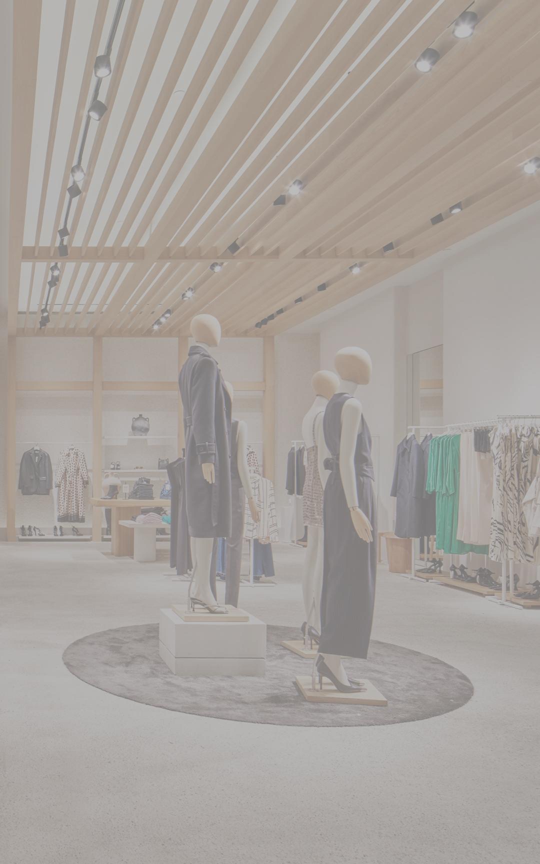 Mannequins styled in a bright retail store interior